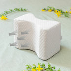 Oreiller pour les jambes avec sangle